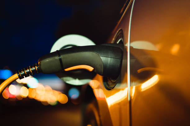 istock Electric car charging on parking 1309402167
