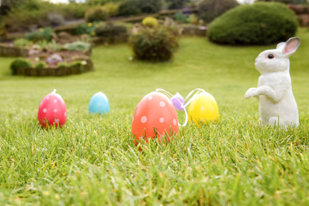 istock easter photography with eggs and a rabbit in a garden 1309402592