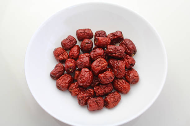 Red jujube of dried fruit on white background.It's a superfood.