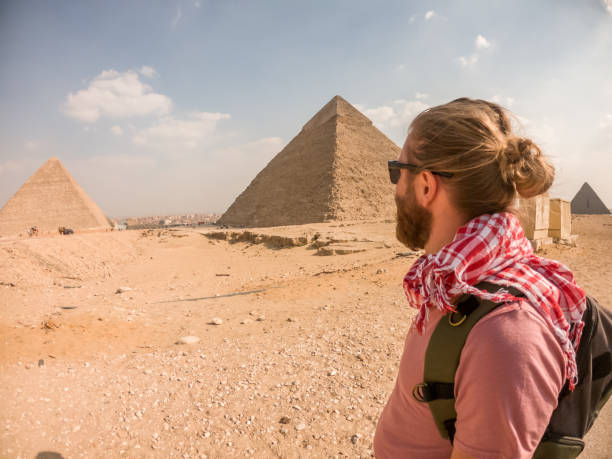 istock Man contemplates wonder of Egypt 1309416394