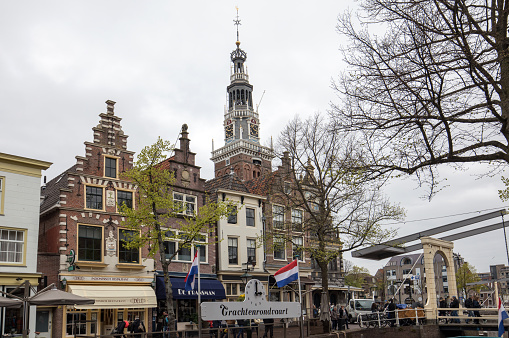 Alkmaar, Netherlands - April 21, 2017: Historic 17th century gabled houses at Mient canal, central Alkmaar, Netherlands