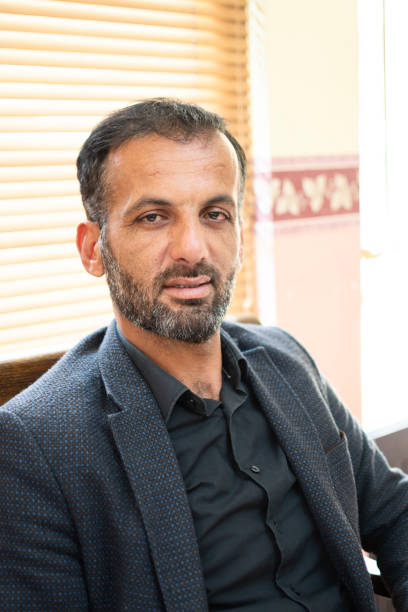 istock Businessman posing to office 1309422031