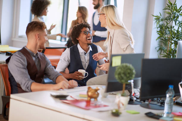 istock Coworkers having a laugh on a break. Colleagues on a coffee break. 1309428118
