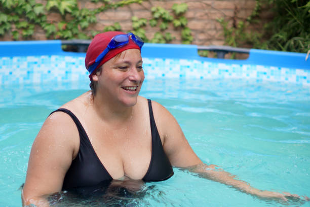 istock woman swimmer in pool 1309429174