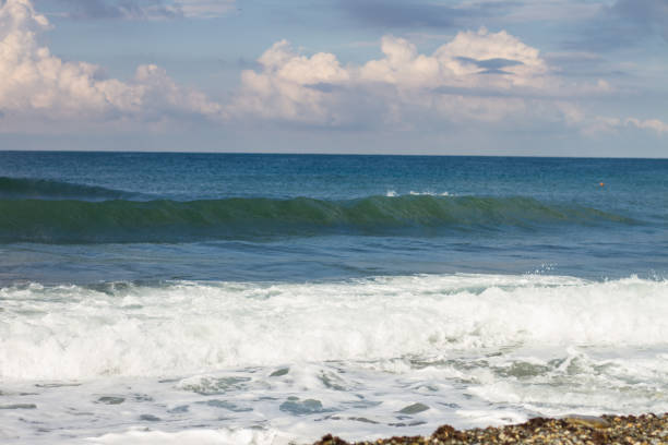 istock Seascape.  Blue Sea, White Waves, Blue Sky. 1309429414