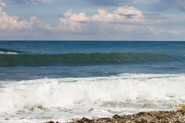istock Seascape.  Blue Sea, White Waves, Blue Sky. 1309429477