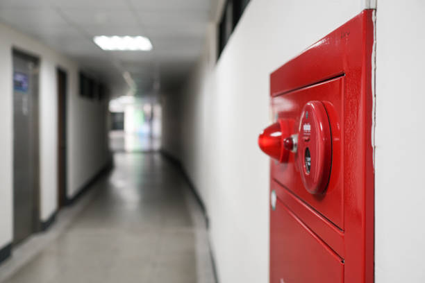 istock Close-up on fire fighting equipment in modern building. The fire hydrant is on the right side of the photo. The shooting location was in a long corridor. 1309429574