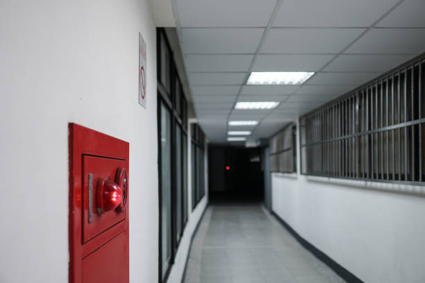 istock Close-up on fire fighting equipment in modern building. The fire hydrant is on the left side of the photo. The shooting location was in a long corridor. 1309429643