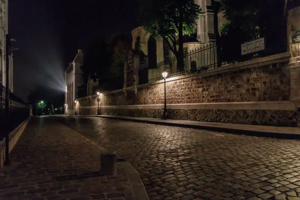 Photo of Empty street in the old residential district at nighttime