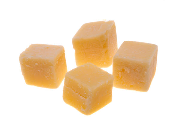 istock squares of cheese isolated 1309433419