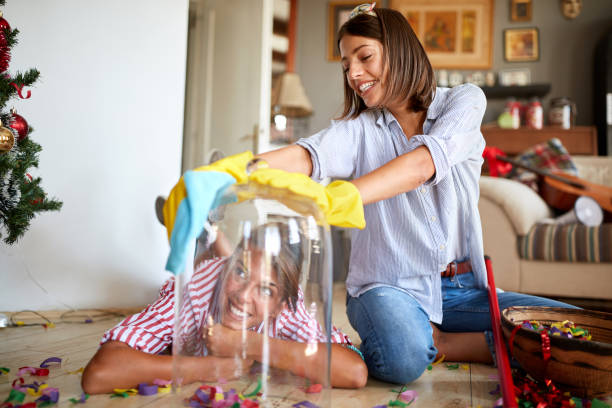 istock Female cleaning glasses bell 1309435097