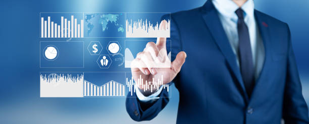 istock Businessman hand pushing business graph 1309436050