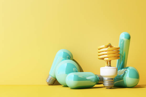 istock Yellow light fluorescent bulb LED on yellow wall background surrounded by blue incandescent lamp - 3D Rendering 1309437598