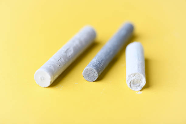 istock Soft pastel on yellow background. Close up. Copy space. 1309439659