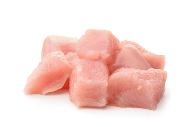 raw chicken fillet chunks - organi imagens e fotografias de stock