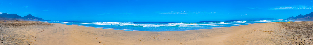 Playa de Los Genoveses, a remote wide beach within walking distance through wild plants and low dunes of sand (7 shots stitched)