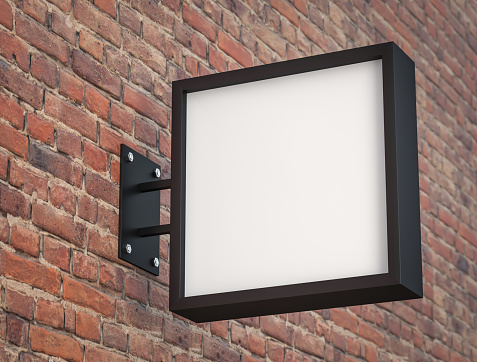 Blank square light box on brick wall background, 3d render