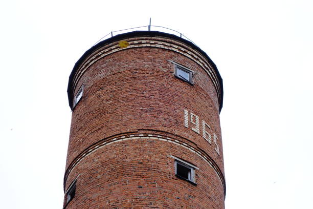 istock Vintage water tower built in 1965 top section 1309460181