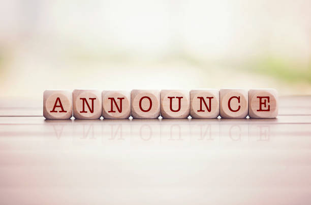istock Announce written on cube wooden blocks. 1309467851
