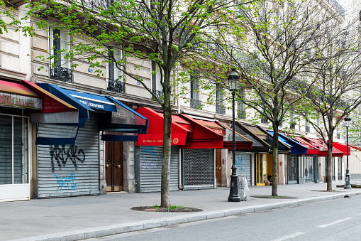 Paris near Notre Dame : gift shops and restaurants are closed during pandemic Covid 19 in Europe. There are no tourists because international travels are not recommended and all museums, restaurants, gift shops... are closed. Paris, France. March 26, 2021.