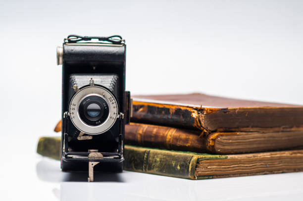 istock Old Leather Covered Books on White Background 1309479956