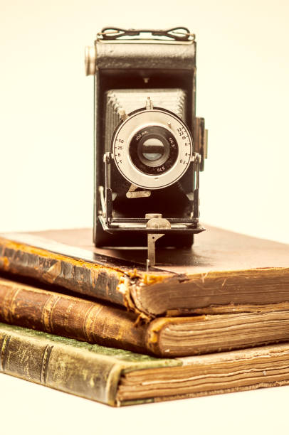 istock Old Leather Covered Books on White Background 1309480012
