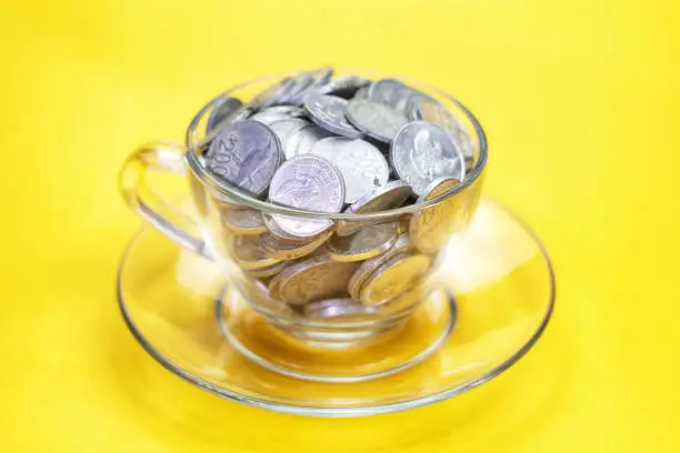 Photo of coins in a clear glass