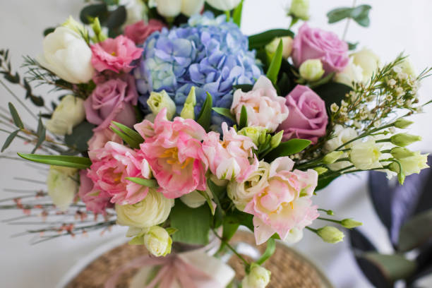 istock Flower bouquet with blue hydrangea and pink tulips 1309481443