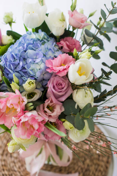 istock Flower bouquet with blue hydrangea and pink tulips 1309481469