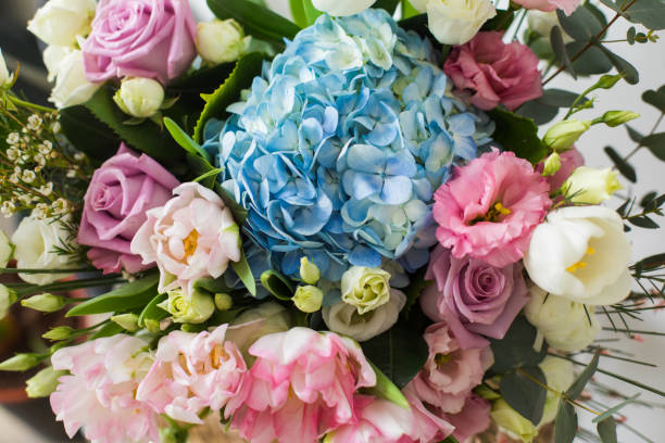 istock Flower bouquet with blue hydrangea and pink tulips 1309481474