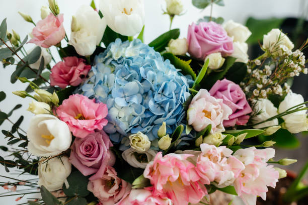 istock Flower bouquet with blue hydrangea and pink tulips 1309481475