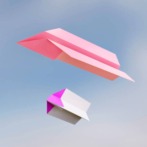 istock Paper planes in the blue sky 1309483302