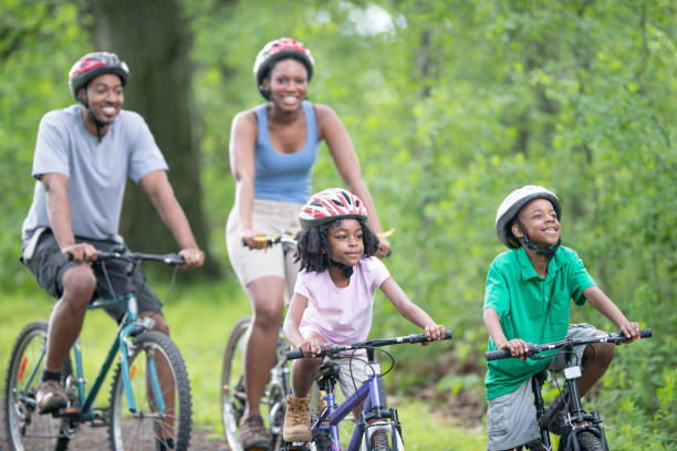 istock African Family Biking Outdoors Together 1309489696