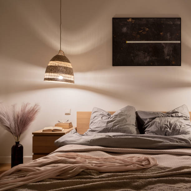istock Cozy bedroom with warm light 1309495131
