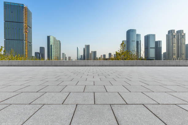istock Empty pavement and the Tianjin financial district 1309498129