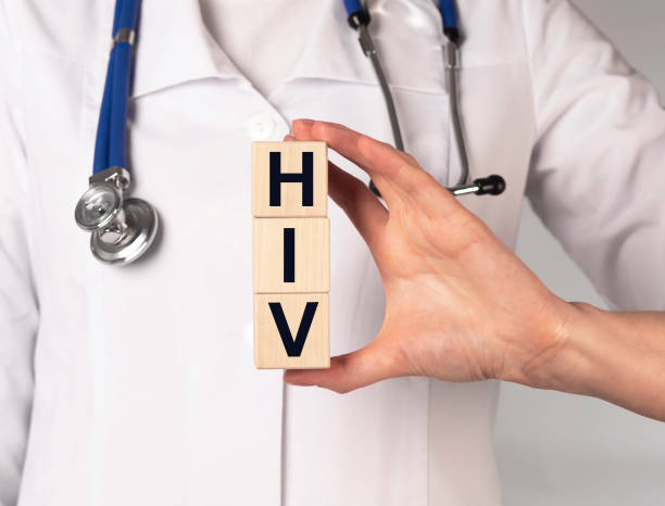 istock HIV acronym, inscription on cubes in doctor hands 1309498754