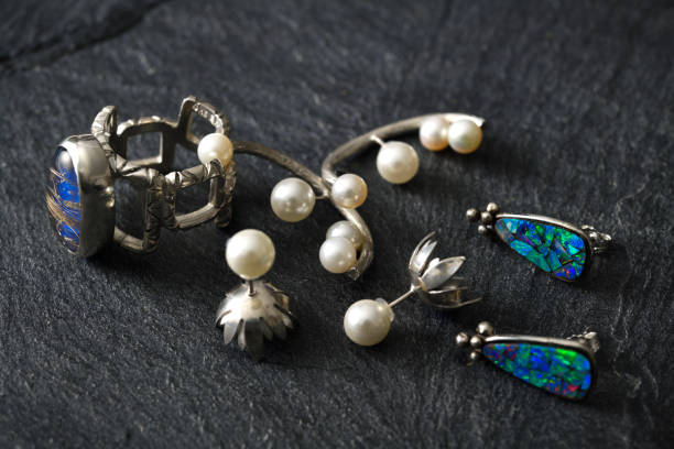 istock Jewelry on black slate 1309502157