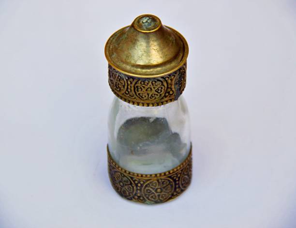 istock Glass bottle decorated with a copper cap. 1309505575