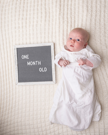 A one month old baby.