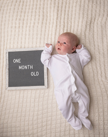 A one month old baby.