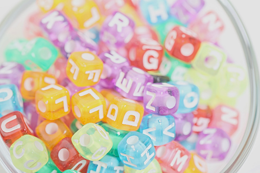 High key Pastel colored Alphabet Beads background