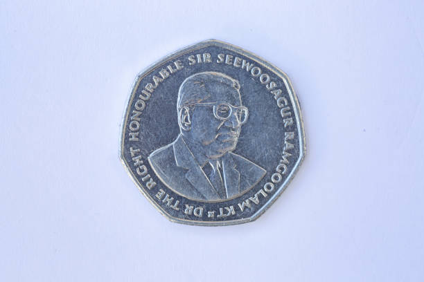 istock Mauritian 10 rupees coin isolated on white background. 1309520129