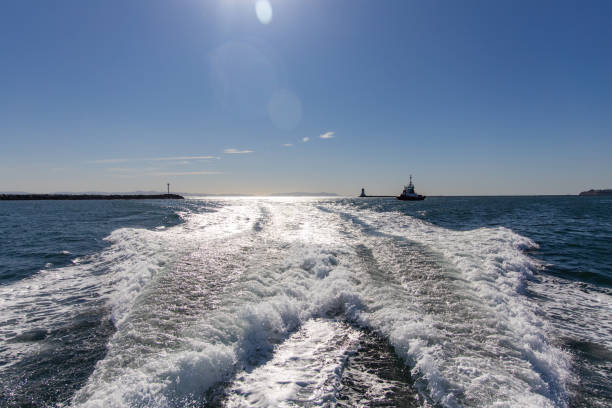 istock Looking back on the boat with Blue Sky 1309524699