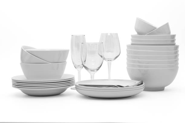 istock set clean dishes glasses on white background 1309525300