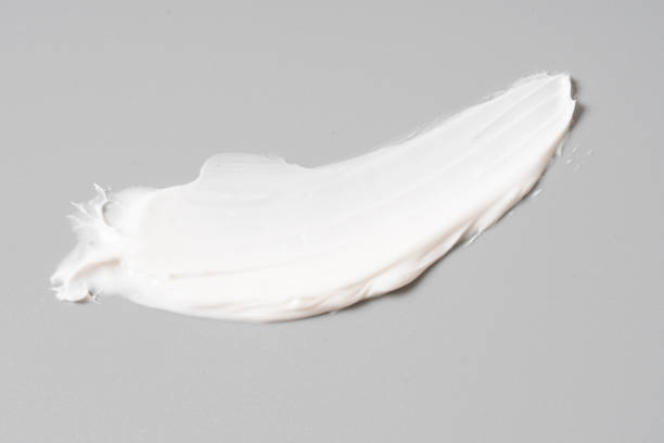 istock white cosmetic face cream texture on white background 1309525303