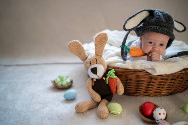 istock Cute baby bunny in the basket 1309525547