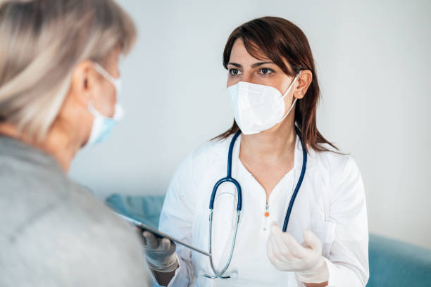 istock Healthcare worker at home visit 1309526457
