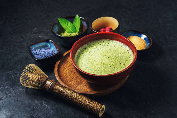 istock Various matcha tea powders on a dark concrete background. Top view. 1309529292