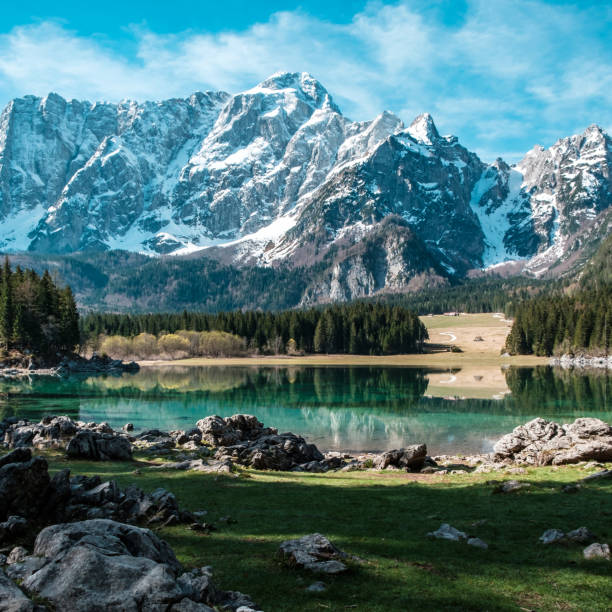 istock Spring morning at the alpine lake 1309529951