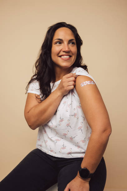 istock Proud woman with vaccination 1309531447